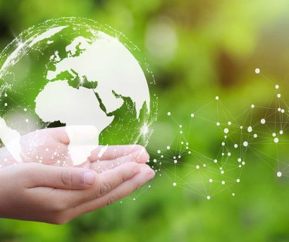 Hender som holder jordklode - miljøfyrtårn